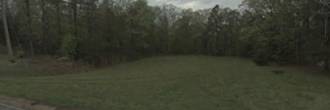 Beautifully treed property in a quiet town on Greers Ferry Lake